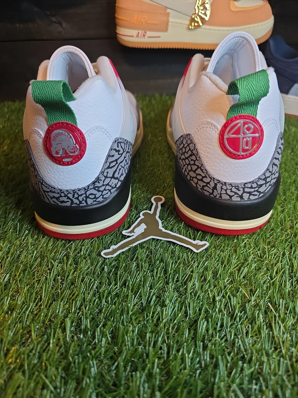 Jordan Kids' Sneakers in White with Black, Red and Green Accents